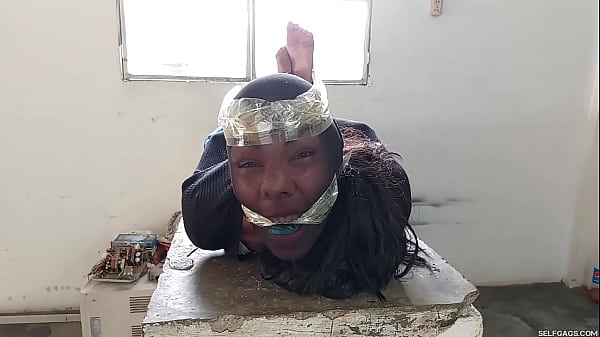 18-Year-Old Female Trickster Gagged In Strict Hogtie With Insane Pantyhose Encasement!